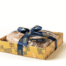 Schiacciata traditional soft flat cake covered with amaretto frosting, sliced almonds and icing sugar (500g)