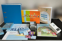 Material des Materialpaketes: Flyer, Handreichung, Spiele, Bücher