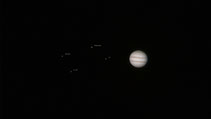 Jupiter mit drei seiner Monde