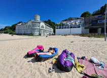 Historic timber bathing pavilion on overcast day at Majori, Jurmala