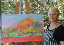 Meg Woods with one of her artworks