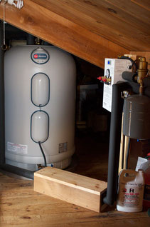 The 'Marathon' brand 50 gallon hot water storage tank for the solar water heater.