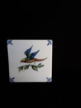 Carreau Oiseau coloré 13  fond bleuté Dimensions 13cm×13cm Faience de Delft