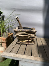 Brosse pour toilettes dans pot en bois flotté