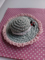 Broche hoedje