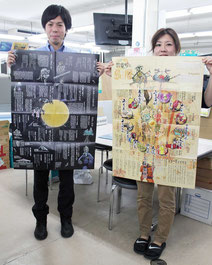 表裏を使って竹富町を紹介するポスター「竹富町の島暦」=9日午後、町役場