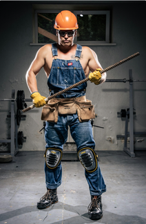 Ein Mann in Arbeitsuniform demonstriert seine Manneskraft.