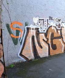 Mit Graffiti besprayte Wand