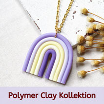 Halskette mit einem Anhänger aus Polymer Clay in Form eines Regenbogens in Lila- und Cremetönen. Text: "Polymer Clay Kollektion".