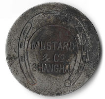 An early token from Mustard & Co Shanghai. From the MOFBA collection.