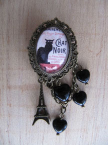 Broche con imagen del cartel Chat Noir