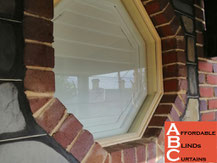 Plantation Shutters in Circle Window