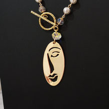 pendentif visage de femme