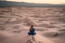 Meditation in desert. Photo by Patrick Schneider on Unsplash. https://unsplash.com/photos/yw1y-alKGrg 