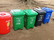 Garbage cans donated to school .Separated into organics, papers, tins, bottles, and plastics