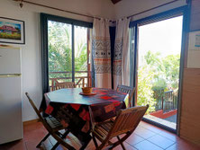 Dining area, bungalow No.6 – table and chairs, direct access to terrace