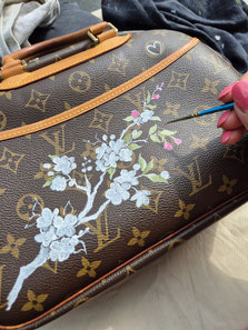 bloesemtak op louis vuitton tas 