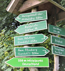 Sign pointing to the center (midpoint) of Germany