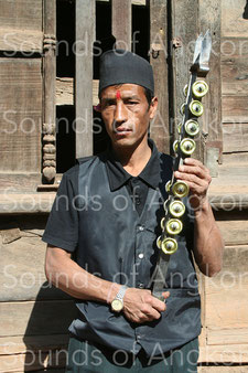 This percussion can be akin to the scraper. Nepal.