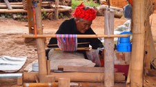 Old woman weaving