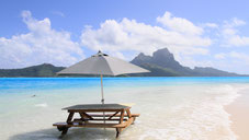 Motu picnic in Bora Bora/ white sand beach with Otemanu view