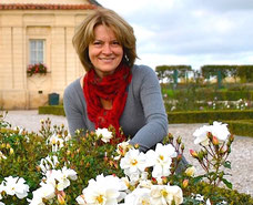 Photo of Swedish speaking Latvia guide Daiga Andersone in a rose garden