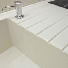 Acrylic solid surface countertop with drains