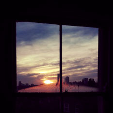 Sunrise in London from typical foggy window