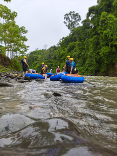 Arenal River tubing with professional guides and stunning nature views.