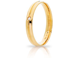 fede nuziale con diamante