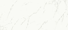 Dekton Kairos, d'un blanc pur et lumineux avec de fines veines grises. Surface ultra-compacte au toucher soyeux, rappelant la finesse du marbre.