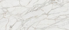 Dekton Morpheus, évoquant la profondeur des marbres naturels. Ses veines grises intenses sur fond blanc cassé créent un contraste saisissant et apportent une touche d'élégance contemporaine à tout intérieur.