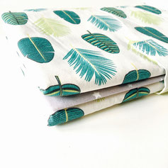 Tapis à langer nomade gris feuilles