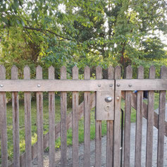 Gate and bell of the Comenius Garden