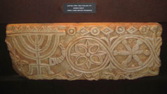 Ancient marble relief with Menorah from the synagogue at Ashkelon