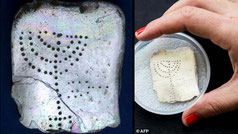mother-of-pearl tablet etched with a menorah in the ancient town of Caesarea