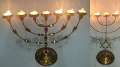 7-tea light candle menorah with 4-petal flower; star of David. Design "The Bluesmith Company," Philippines