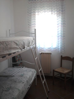 Seconda camera di più piccole dimensioni con letto a castello