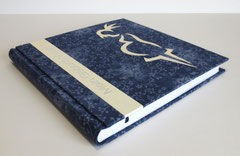 Geburtenbuch mit Storch