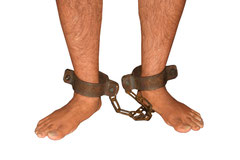 Prisoner with ankle chains