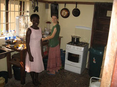 Hannah and her friend Joy, baking banana bread