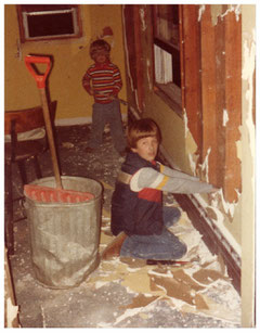 My brother and me (I'm the younger one) destroying some walls and breathing in some stuff we probably shouldn't have been breathing in.