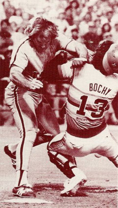 Pete Rose bowls over Astros catcher Bruce Bochy to score the go-ahead run in the 10th inning.