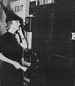 Managing her home from a soundstage, Irene Dunne talks on the phone during the filming of the 1937 Columbia feature, THE AWFUL TRUTH.