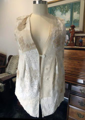 Hand embellished vest with vintage doilies and linens, front view