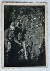 Walter (2nd from left with field cap and beard) and his mortar squad around Belfort, November 1944 (Photo courtesy Family Roland Laich)