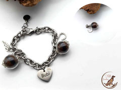 PH 9: 2 Glasperlen (16mm) gefüllt mit Pferdehaar, ein graviertes Herz und Anhänger ganz nach Kundenwunsch zieren dieses Bettelarmband. Alle silbernen Elemente sind aus Edelstahl. (42Euro)