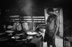 Cook at the local mess,Kainakeri village, Kerala, 2013