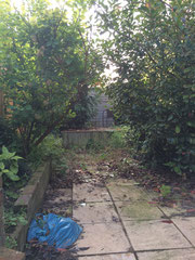 'Before' shot of rear patio garden in Lindfield