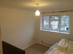 Dulux Light & Space (Frosted Dawn) walls complimented with white ceilings and wood in this spare bedroom